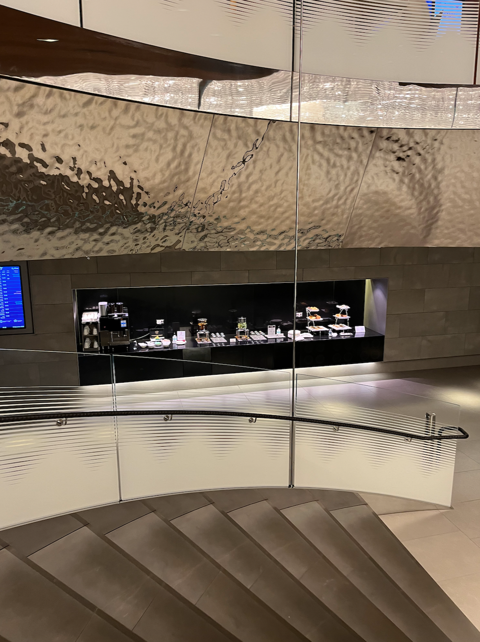 The snack and coffee station at the Qatar Airways Al Mourjan Business Lounge.