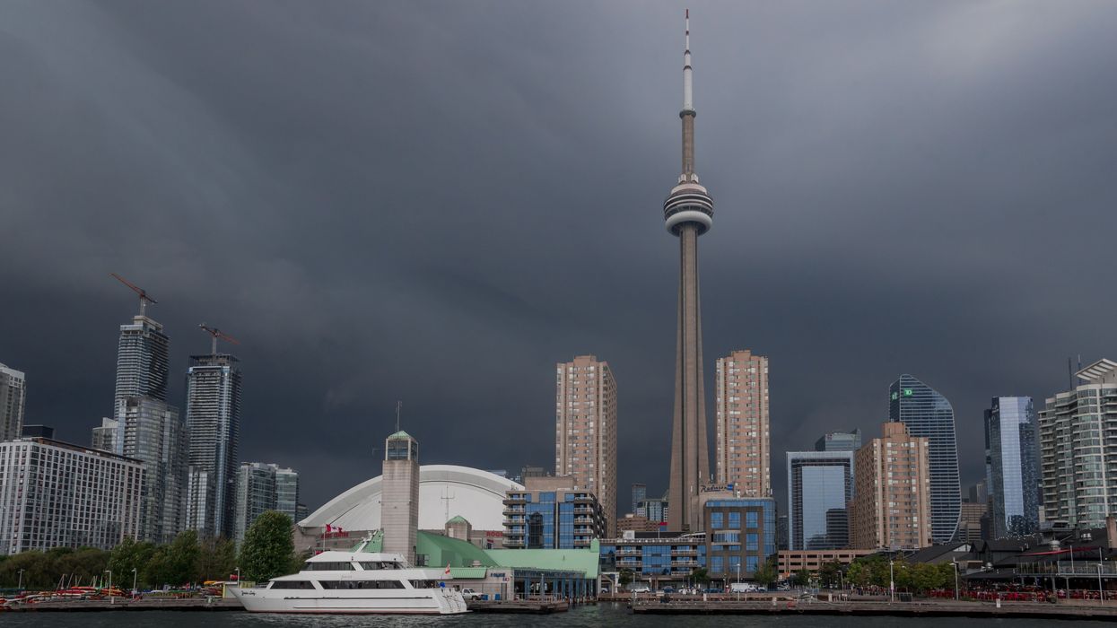 The Toronto skyline with CN Tower and the Rogers Centre prior to a heavy thunderstorm.