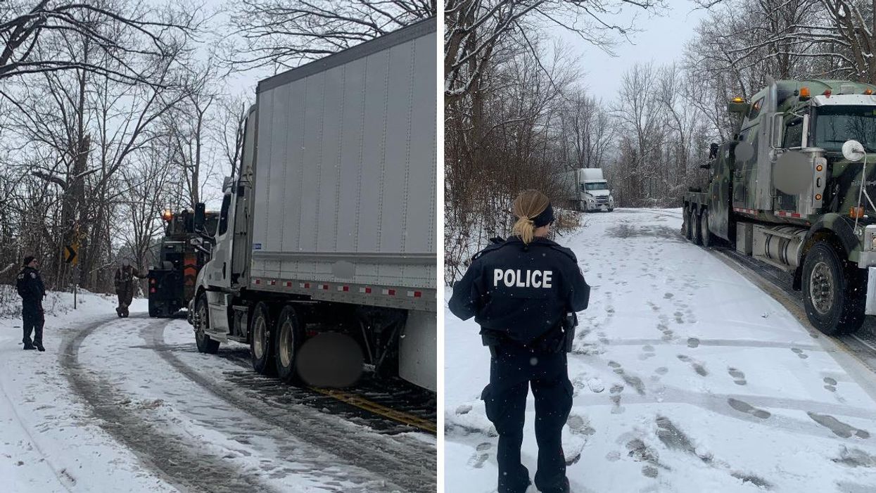 The transport truck stuck on a road near Norval. Right: A police officer looking at the truck.