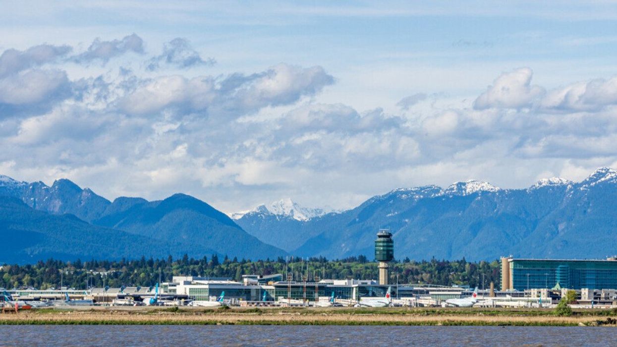 The Vancouver Airport with mountains as the backdrop.
