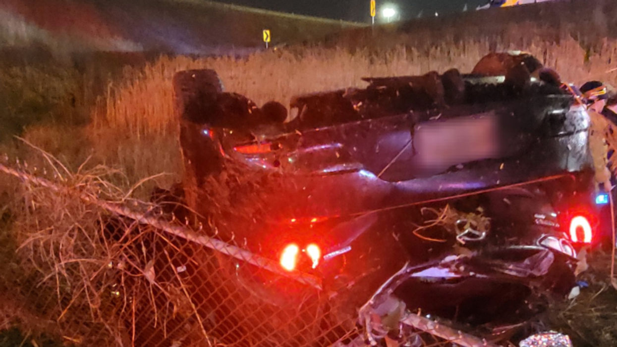 The vehicle that rolled over on Highway 427.