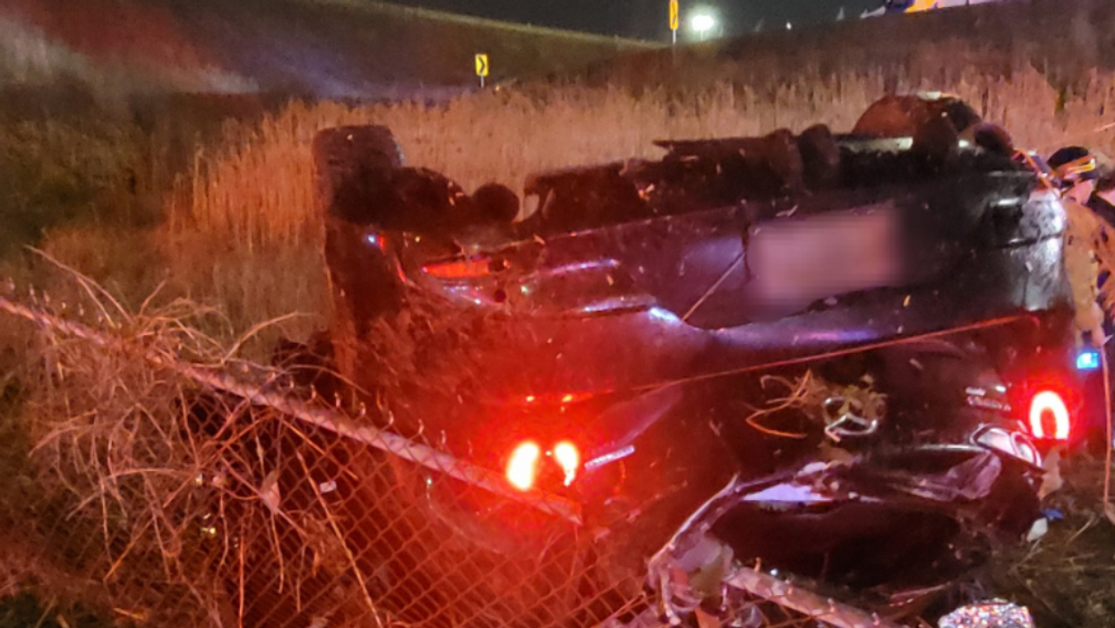 The vehicle that rolled over on Highway 427.