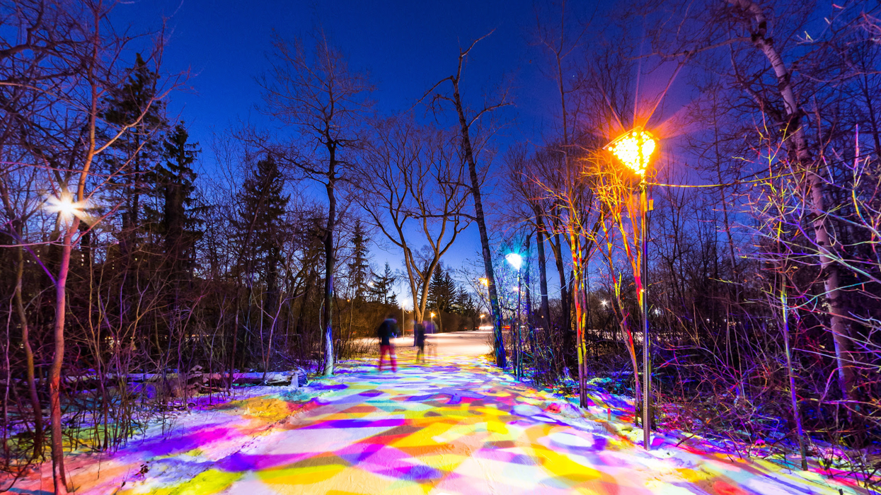 The Victoria Park IceWay in Edmonton is lit with rainbow lights.