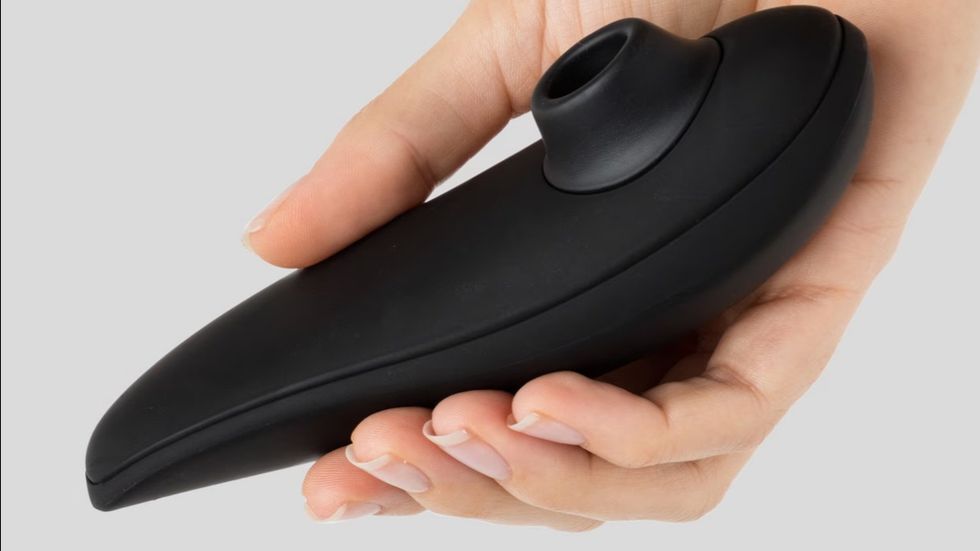 The Womanizer Classic Rechargeable Clitoral Stimulator on display
