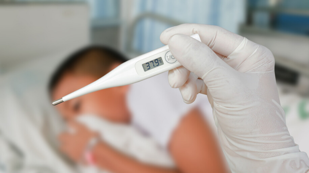 Thermomètre et patient malade.