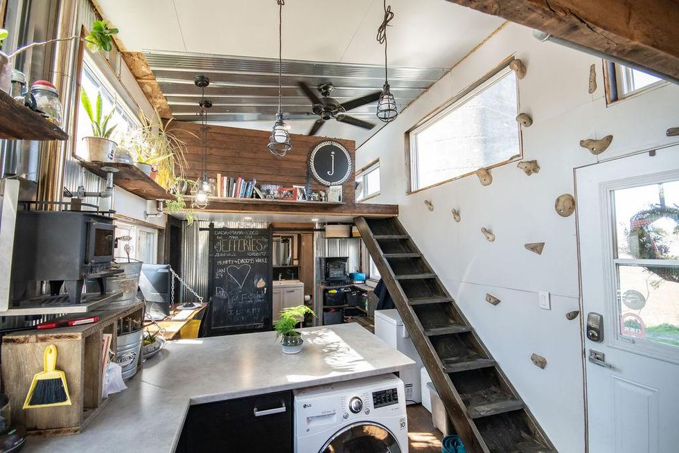 This $52K Tiny Ontario House Is A Portable Shipping Container & Has A Rock Climbing Wall