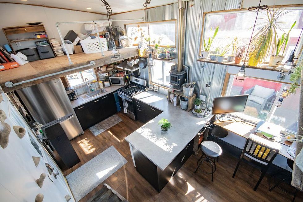 This $52K Tiny Ontario House Is A Portable Shipping Container & Has A Rock Climbing Wall