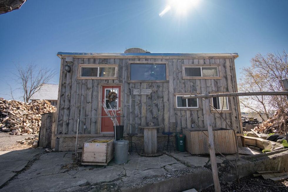 This $52K Tiny Ontario House Is A Portable Shipping Container & Has A Rock Climbing Wall
