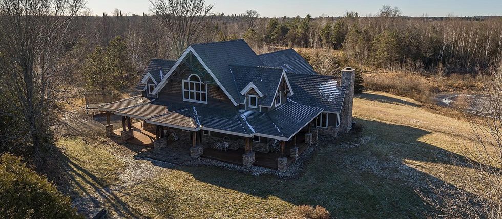 This Home Estate For Sale In Ontario Is A Charming Retreat With A Cozy Treehouse & 5 Ponds