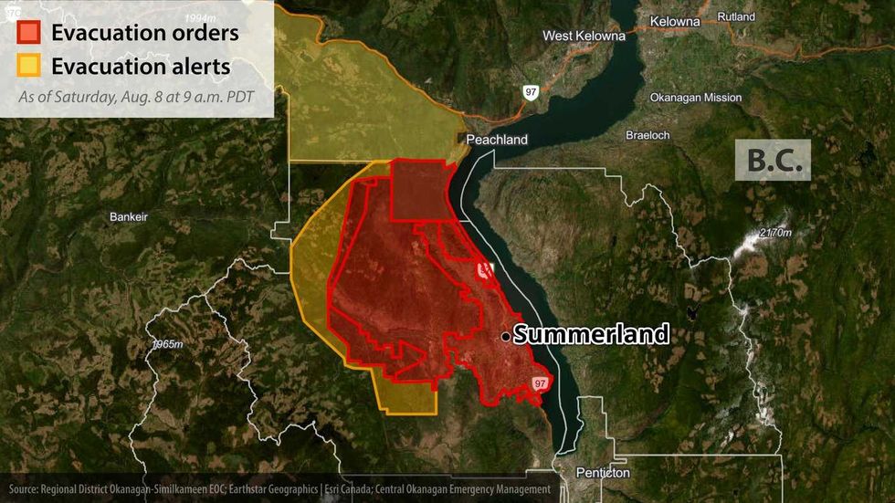 Thousands flee B.C. fire, RCMP say death reported
