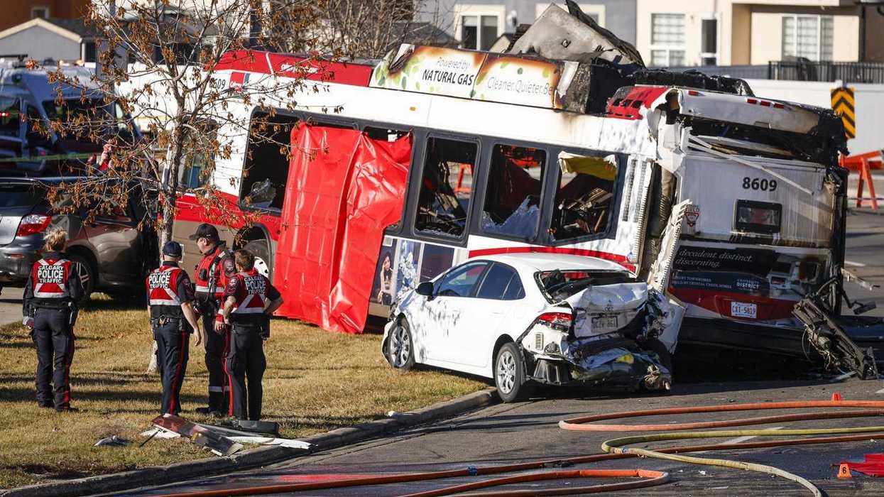 Three dead in fiery crash of Calgary transit buses