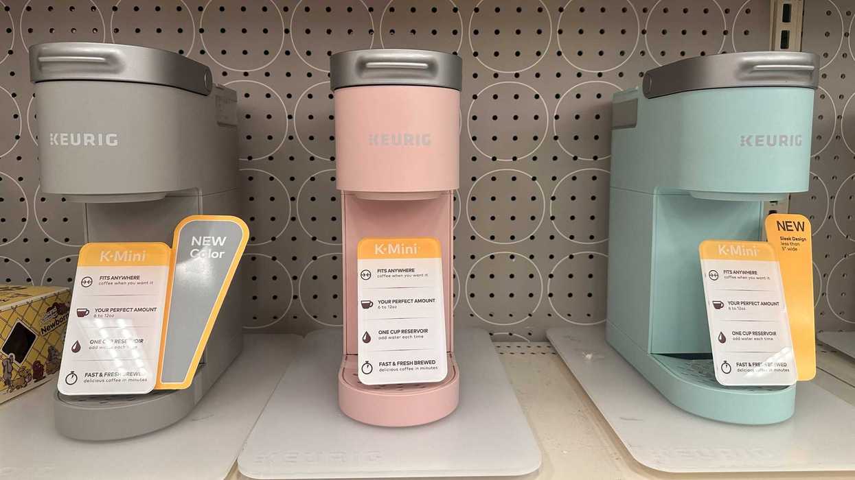 three keurig coffee machine on shelf in store