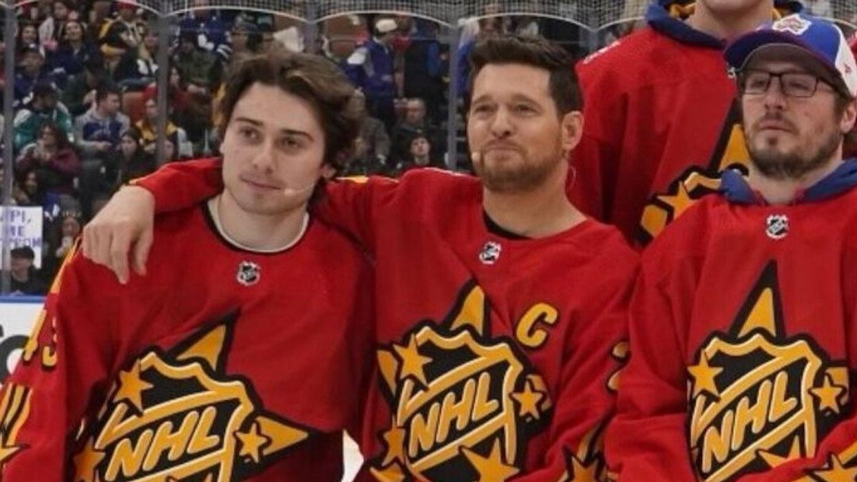 Three men in red NHL All-Star jerseys.