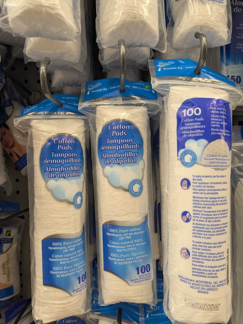 Three packages of cotton pads at Dollarama
