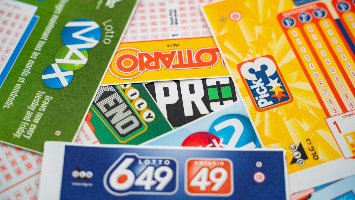 Tickets for several Canadian lottery games, laid out.