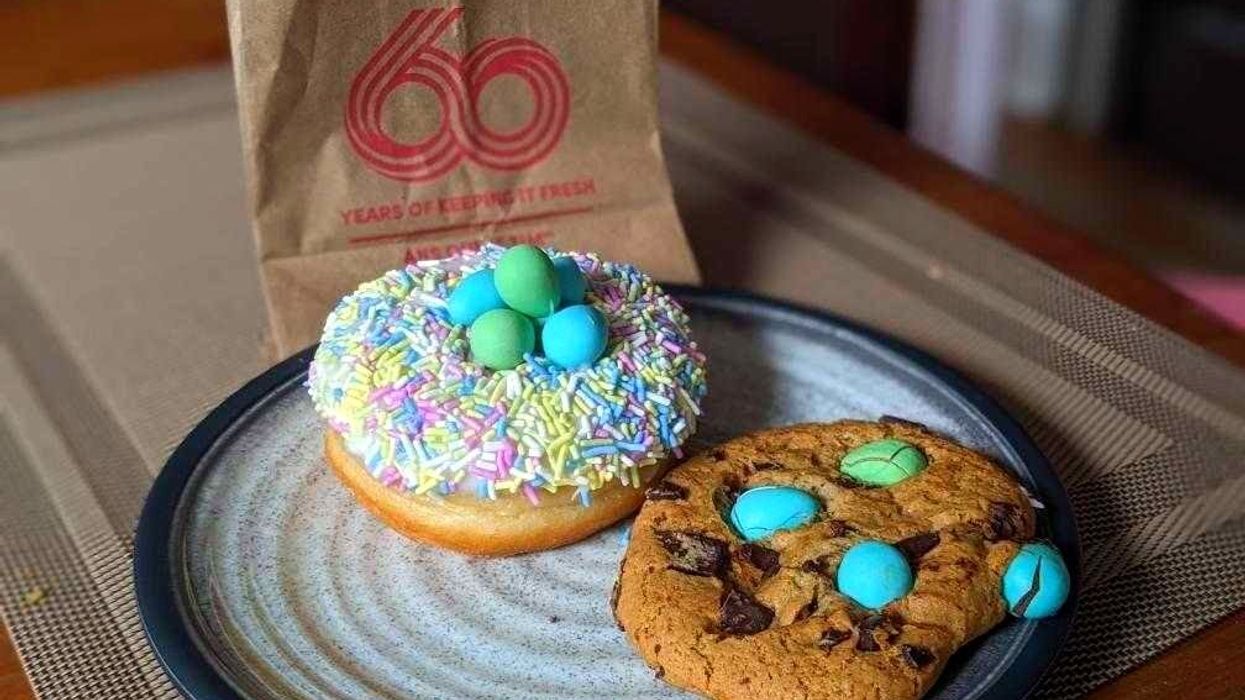 Tim Hortons Cadbury Mini Eggs Dream Donut and the Cadbury Mini Eggs Cookie on a plate.