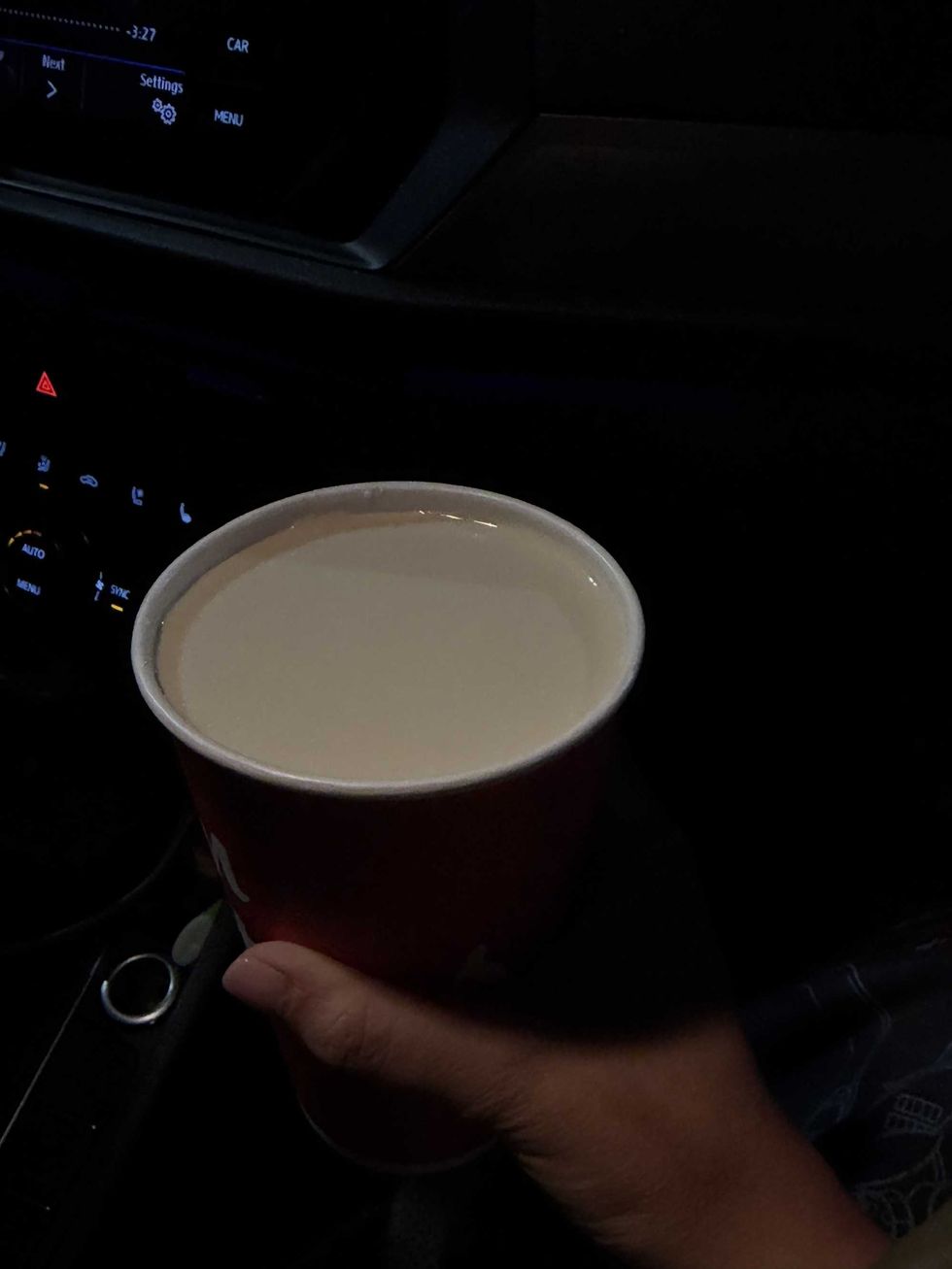 Tim Hortons' Cup with ambiguous white liquid
