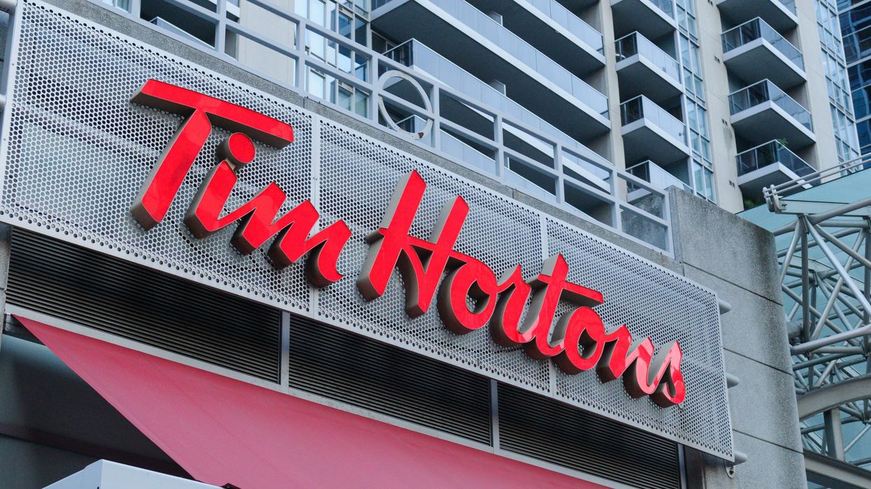 tim hortons sign on the exterior of a location in toronto