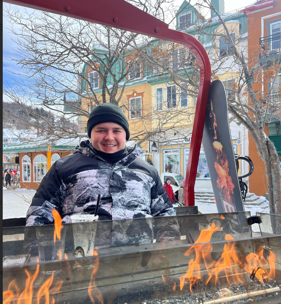 Tom\u00e1s Keating poses amidst the snow in Canada.