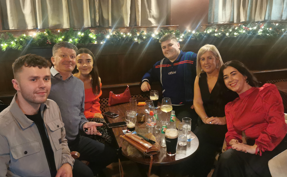 Tom\u00e1s Keating smiles with his family in 2024.