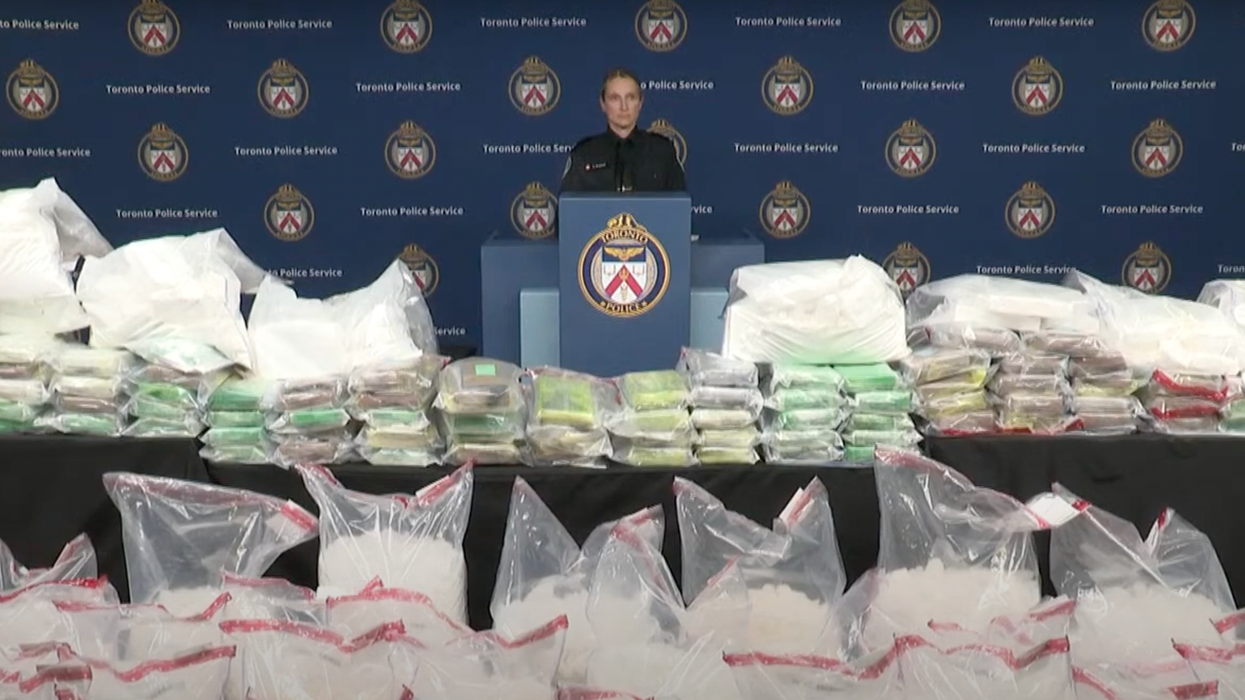 Toronto police at a press conference with all the seized drugs.