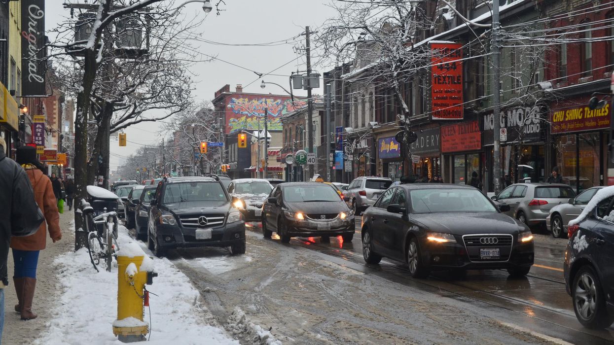 Toronto traffic on Queen Street during winter.