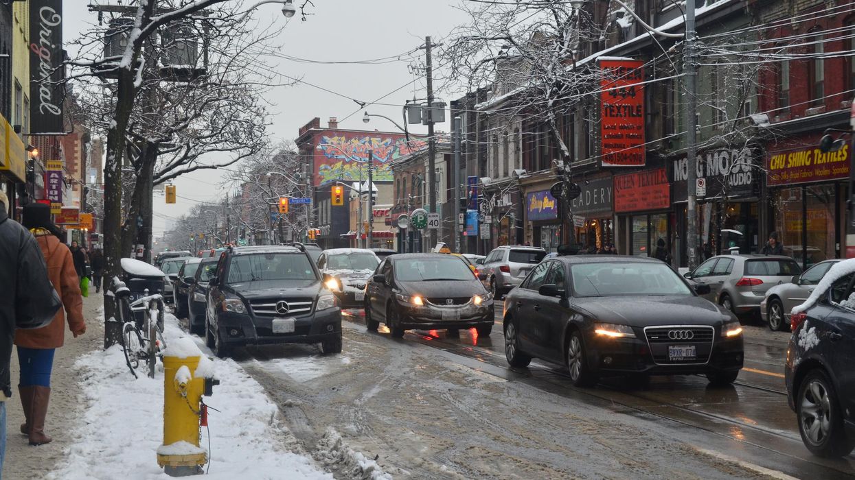 Toronto traffic on Queen Street during winter.