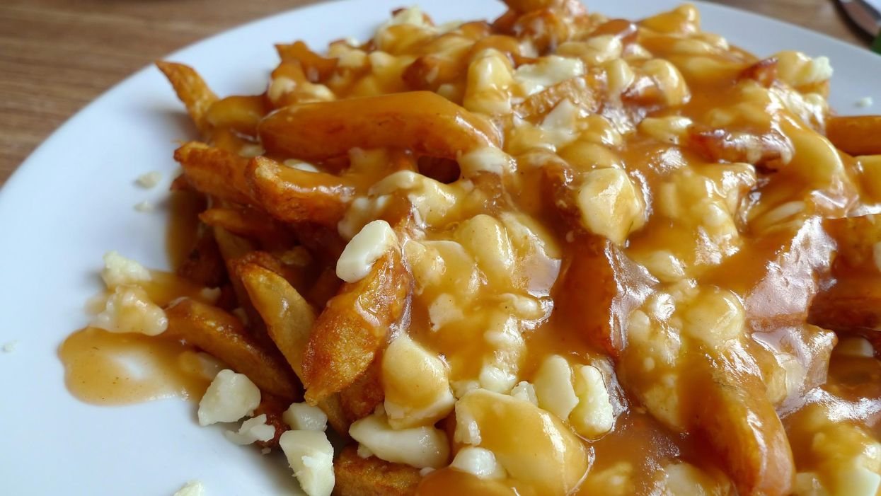Traditional poutine with fries, cheese curds and gravy.