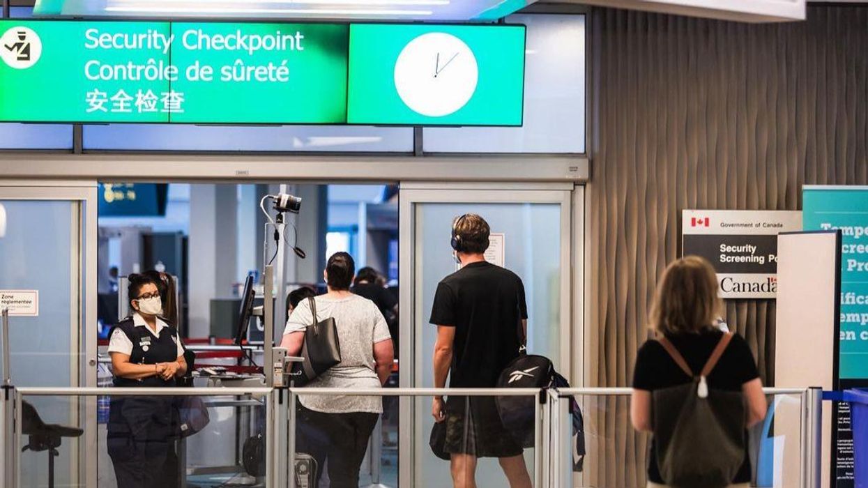 Travellers at the Vancouver International Airport.