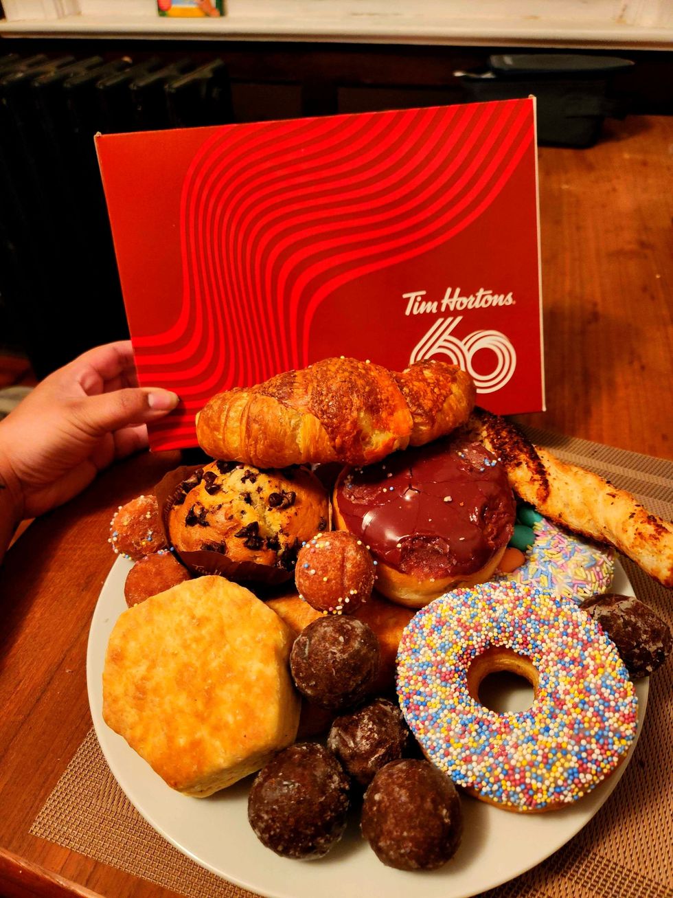 Treats from Tim Hortons laid out on a table.