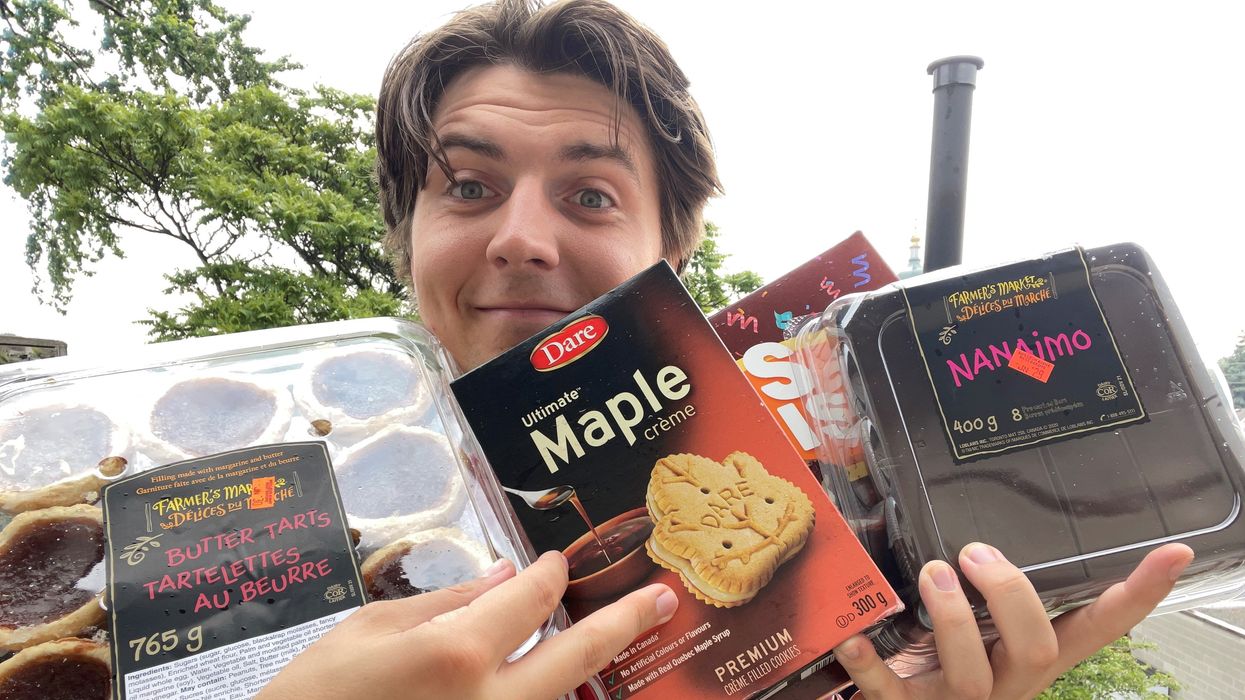 Tristan holding all of the treats.