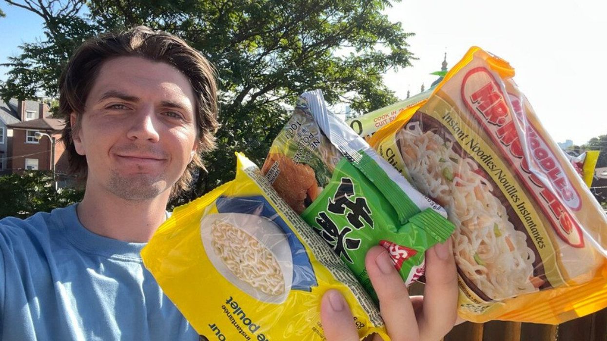 Tristan Wheeler holding all of the noodles.