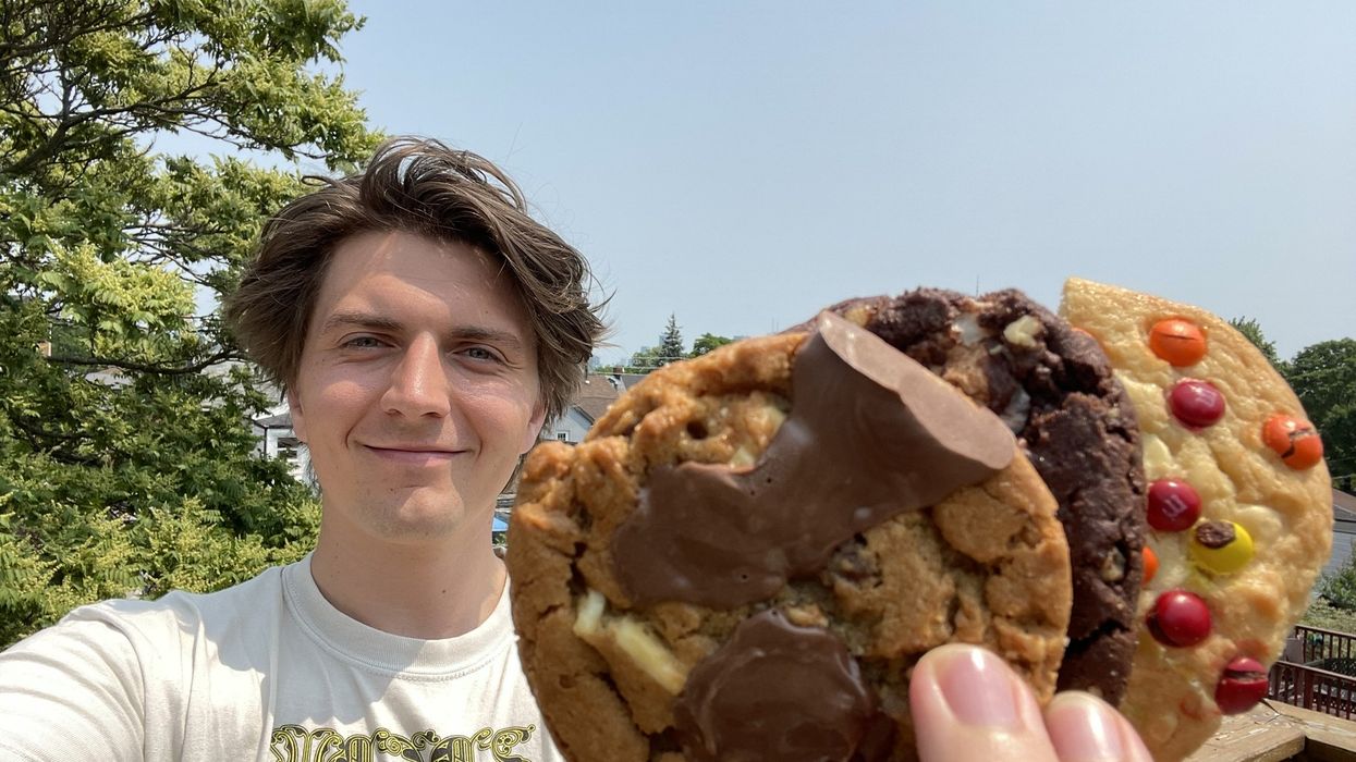 Tristan with the three cookies.