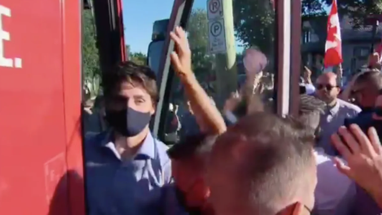 Trudeau in London while stones were being thrown. 