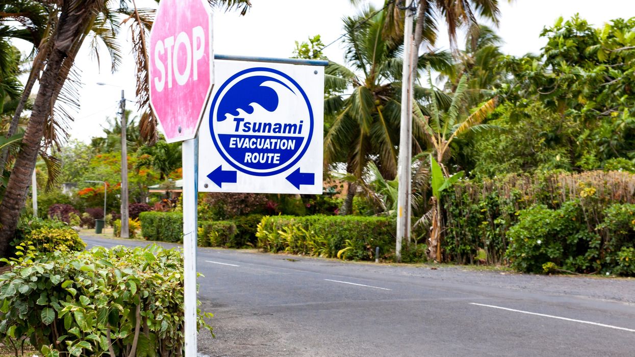 Tsunami evacuation route sign.