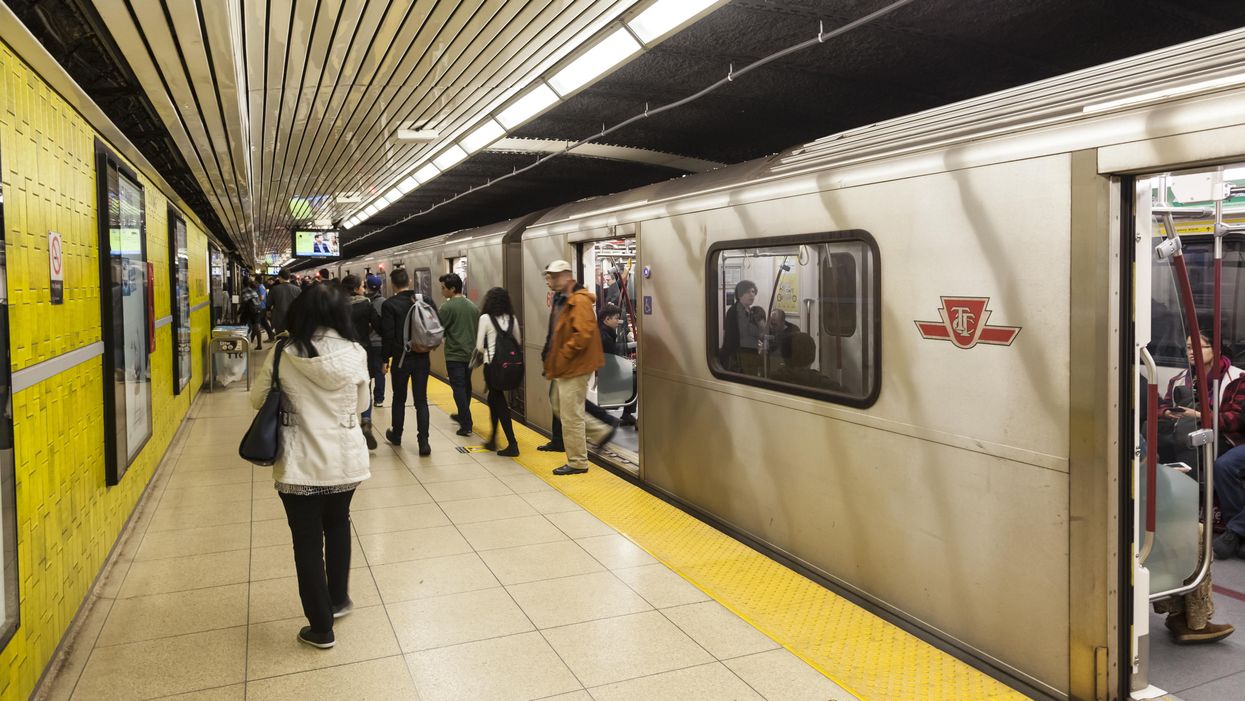 TTC subway train stopped at a station.