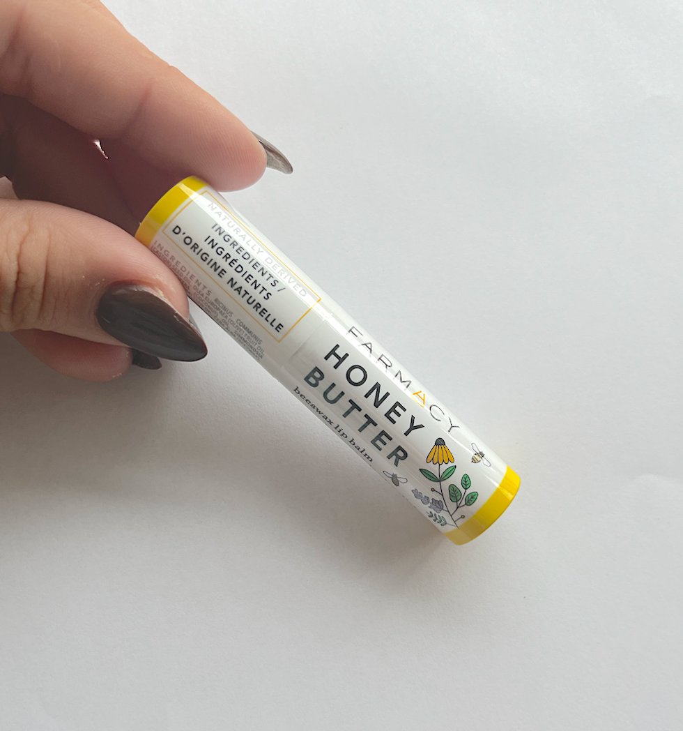 Tube de baume \u00e0 l\u00e8vres blanc et jaune Honey Butter.