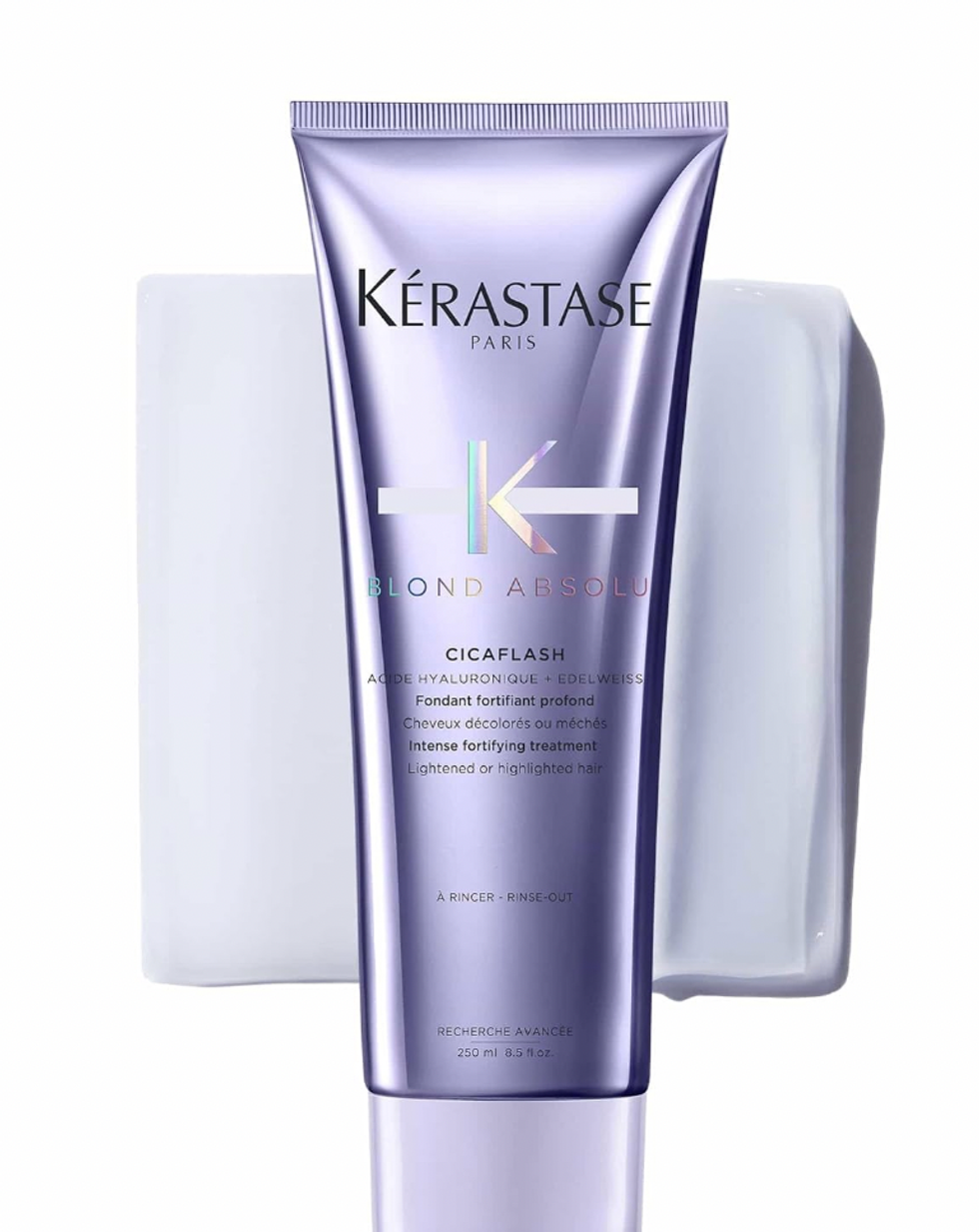 Tube mauve de revitalisant (fondant) K\u00e9rastase de la ligne Blond Absolu.