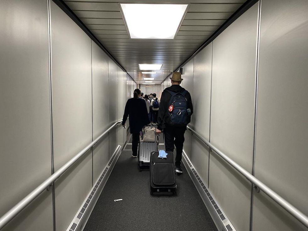 tunnel to board a Swoop flight to Cancun from Toronto
