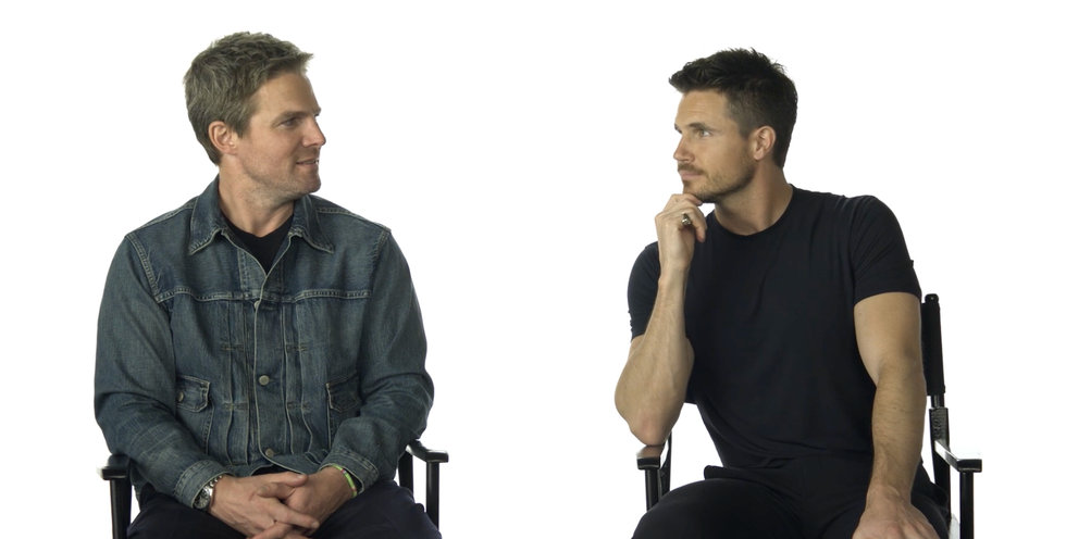 Two actors looking at each other during an interview.