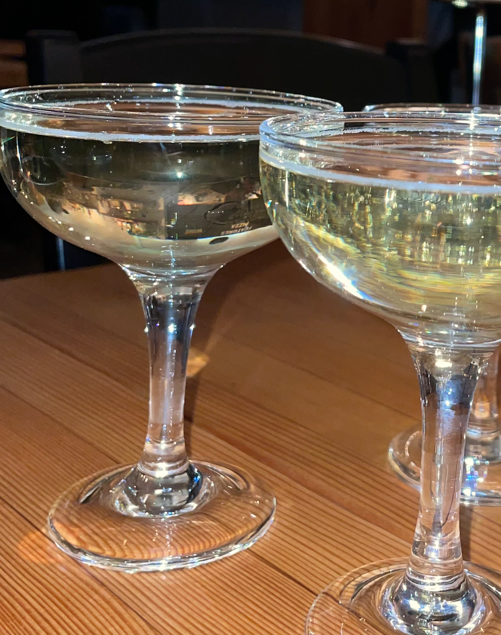 Two champagne glasses.