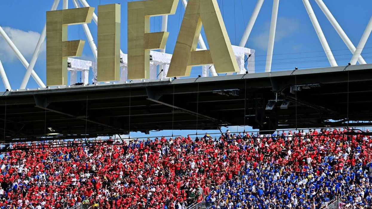 Two charged after officers assaulted at stadium
