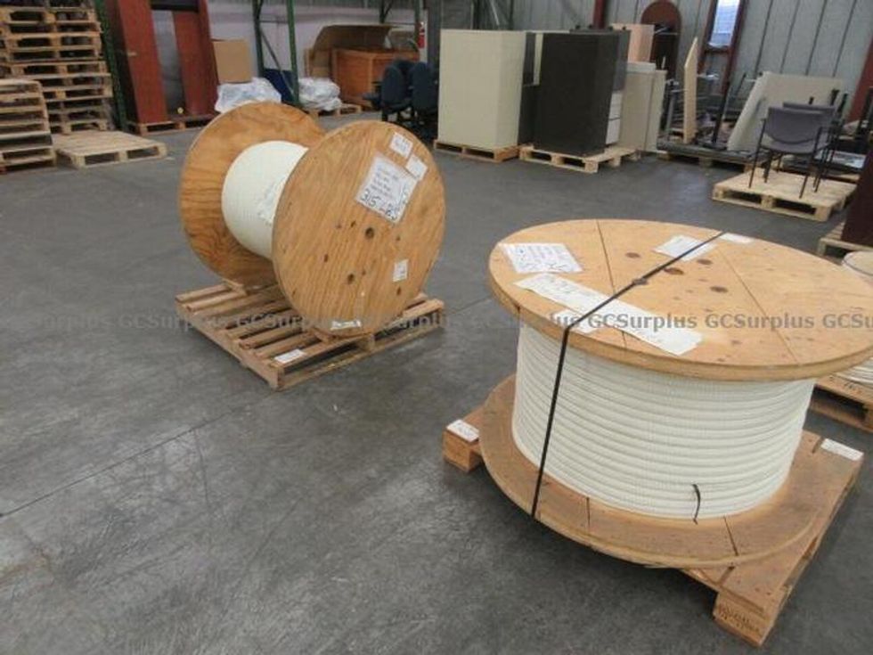 Two giant spools of nylon cord