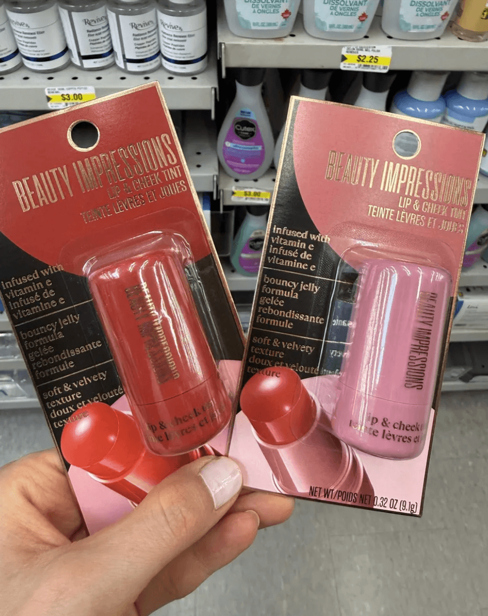 Two packages of Beauty Impressions lip and cheek tint in hand at a store.