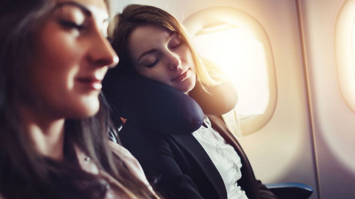 Two passengers on a plane.