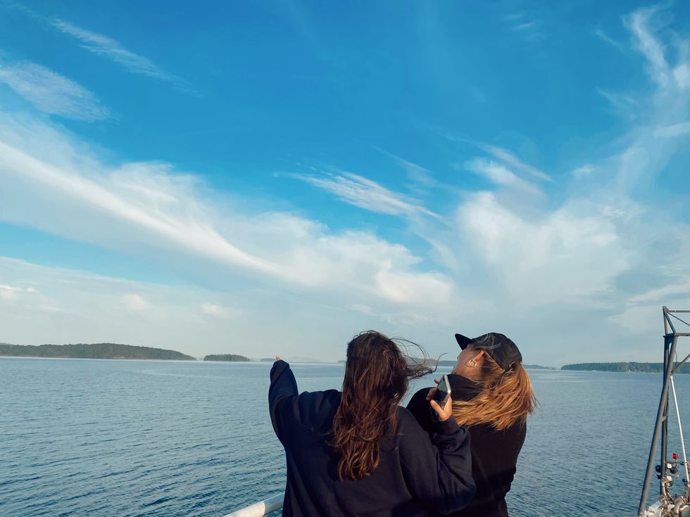 Two people on a ferry.
