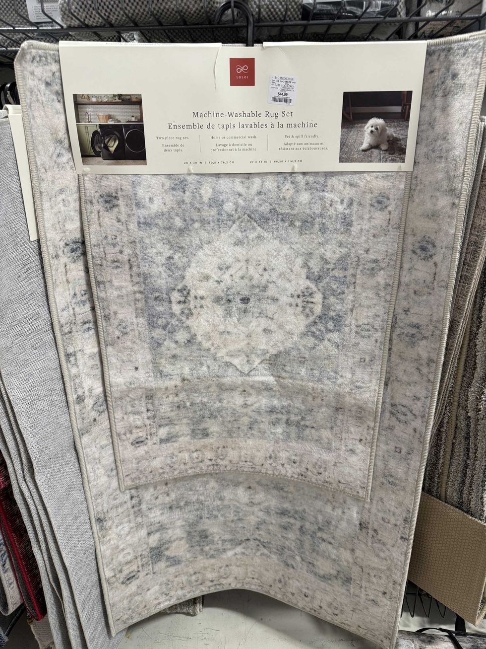 Two rugs that say machine washable on them.