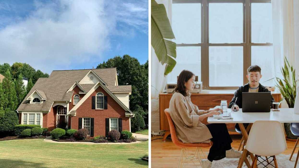 Two-storey brick suburban home with landscaped front yard and trees., Right: Two people working on laptops together at a table in a bright home office.