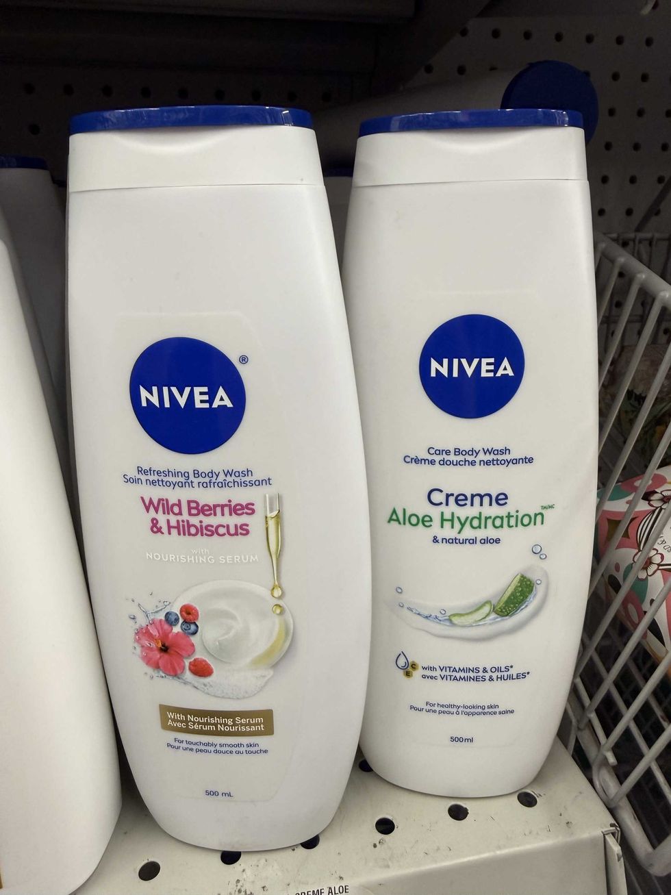 Two white bottles with a blue label that says Nivea.