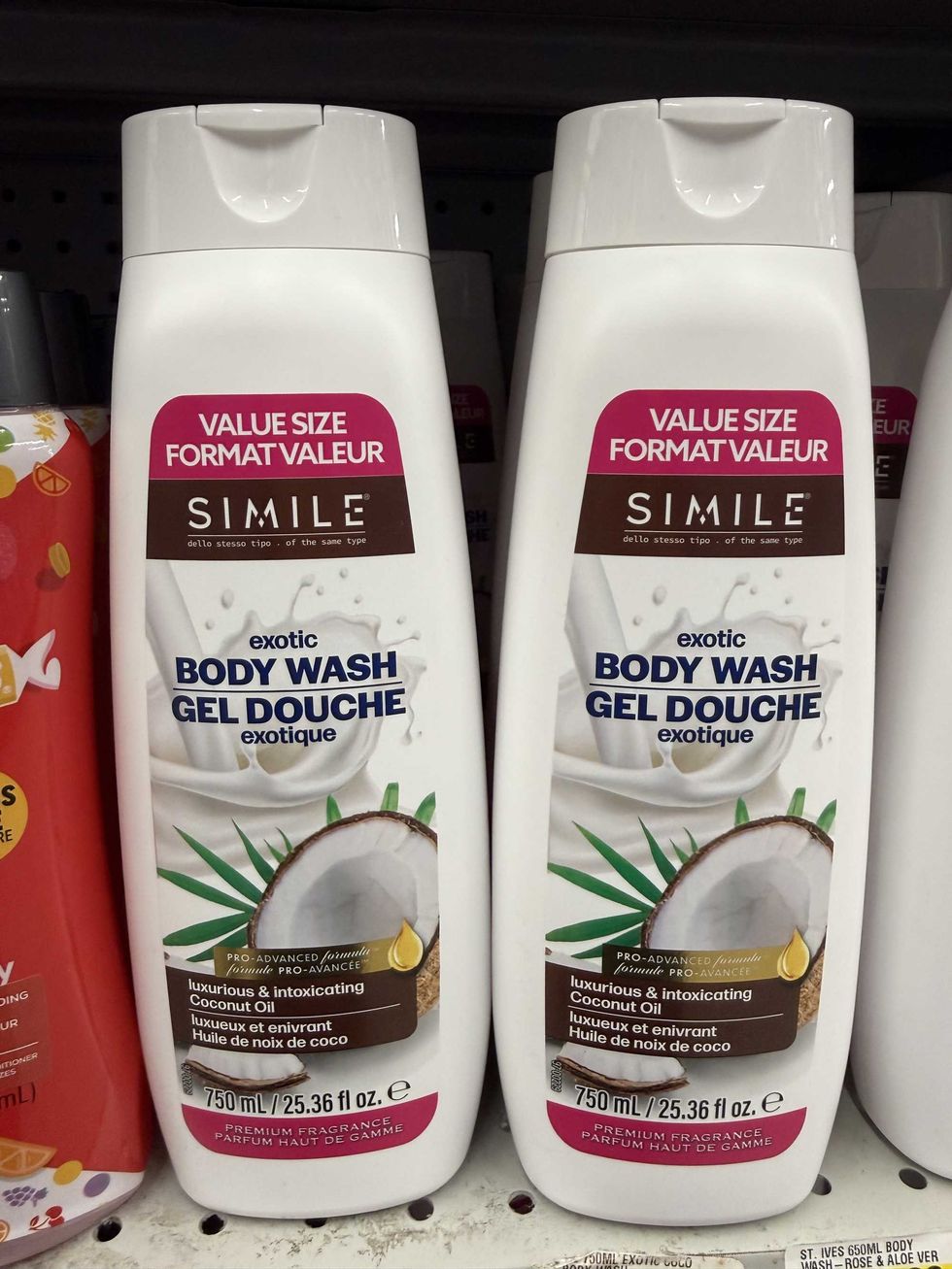 Two white bottles with a photo of a coconut on the front and a label that reads exotic body wash.